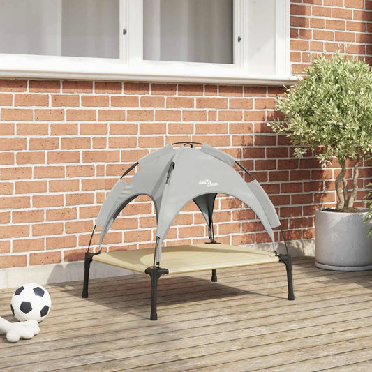 Hundebett VidaXL – Stahl-Silber-Grau, 63 × 49,5 × 60 cm, Outdoor vor Backsteinwand